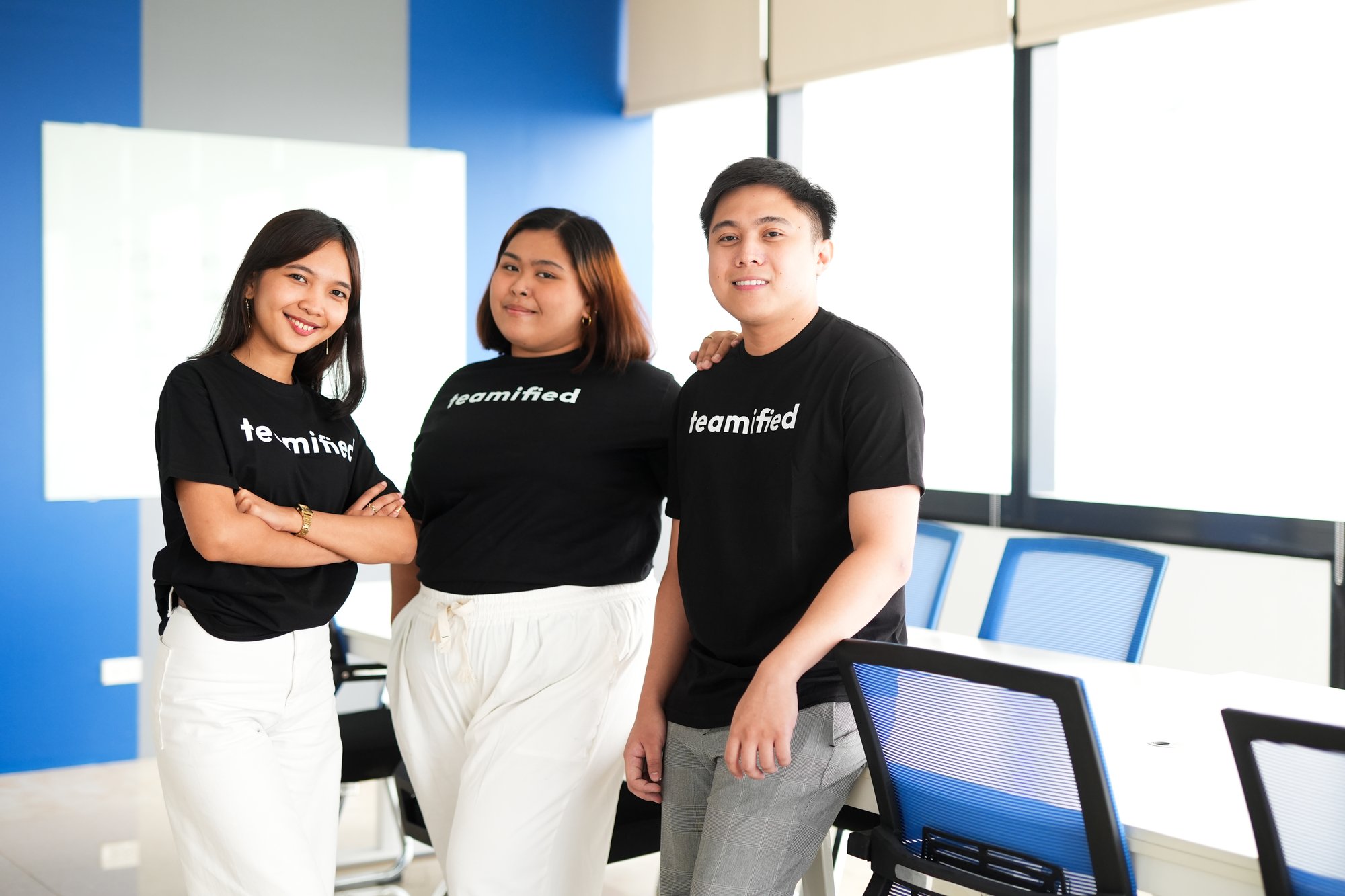 Global hiring platform team in modern office representing AI-driven recruitment and offshore talent solutions